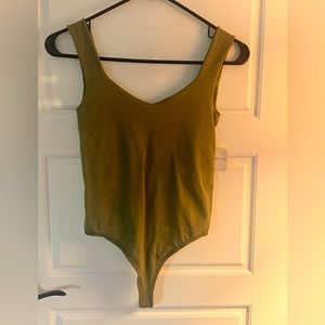 Free People NWT olive green seamless bodysuit. XS/S